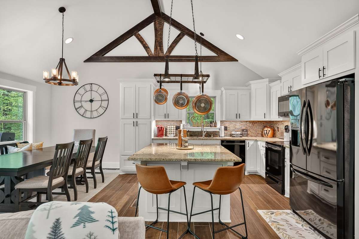 Huge designer dining table & island seating for gatherings.