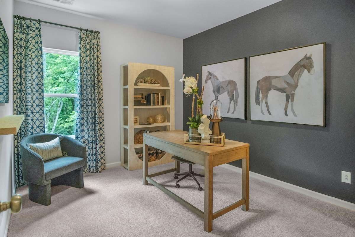 This picture is from our furnished and decorated model home in the community.  Window placement and color scheme may vary per unit location.  Ask agent for more specific details regarding color and options