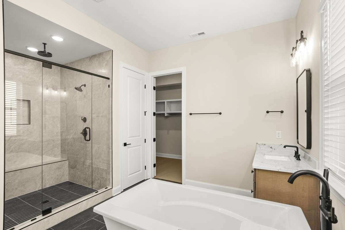 Master bathroom and walk in closet from another angle