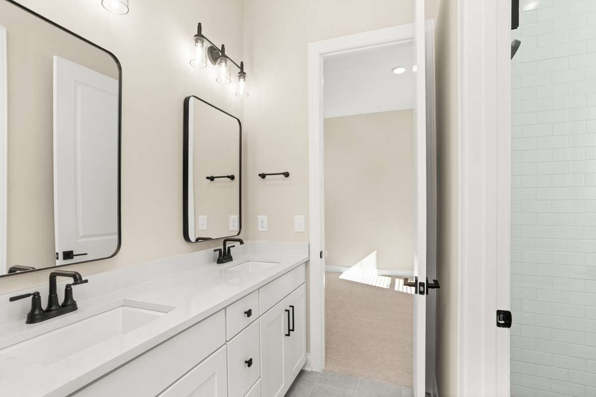 Jack and Jill bathroom between the first floor bedroom 1 and bedroom 2
