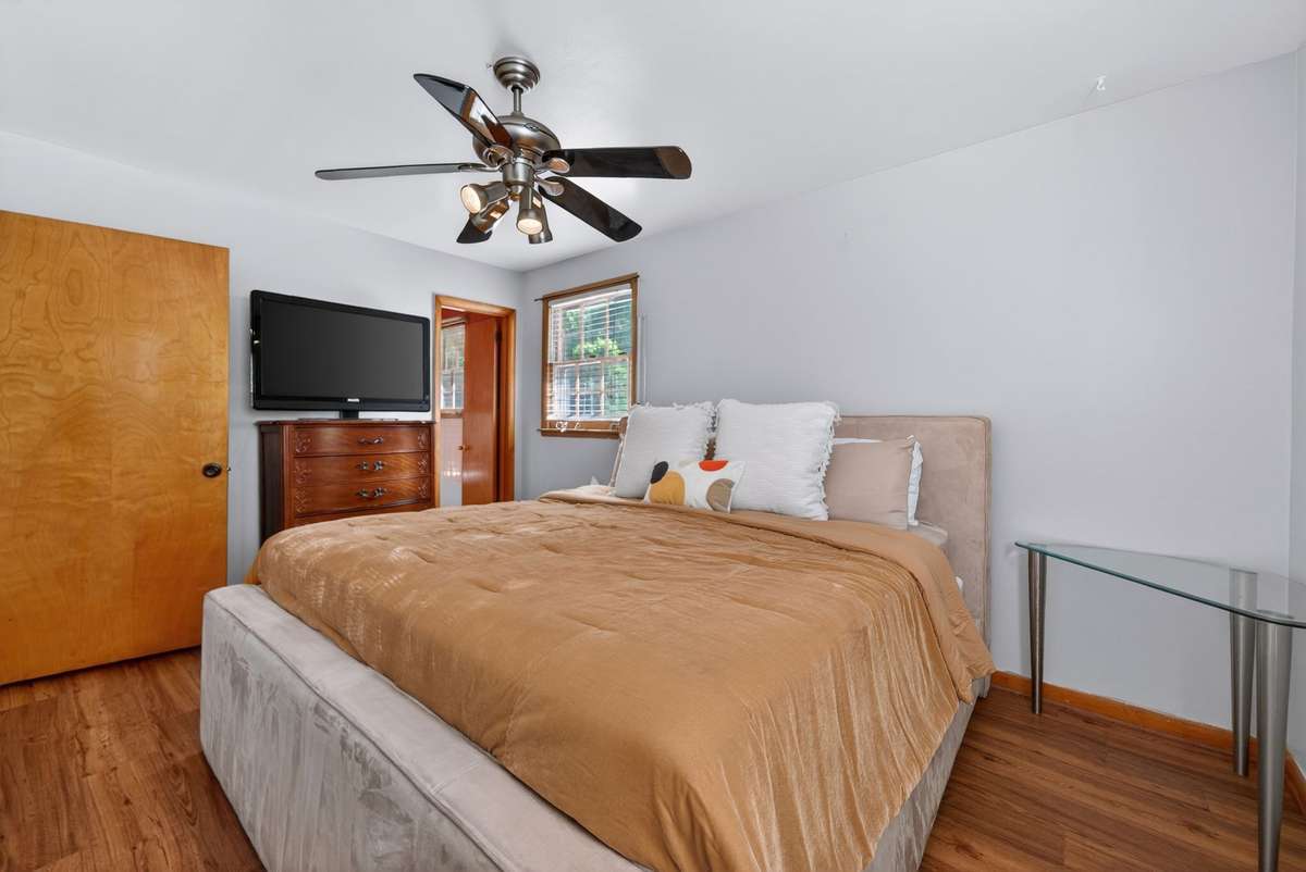 Or you could choose the primary bedroom on the main level for proximity to the other bedrooms.