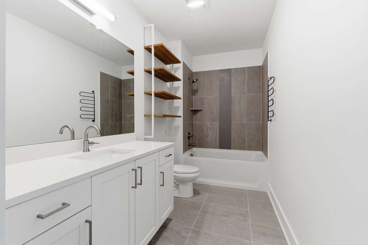 Tiled floor and bath