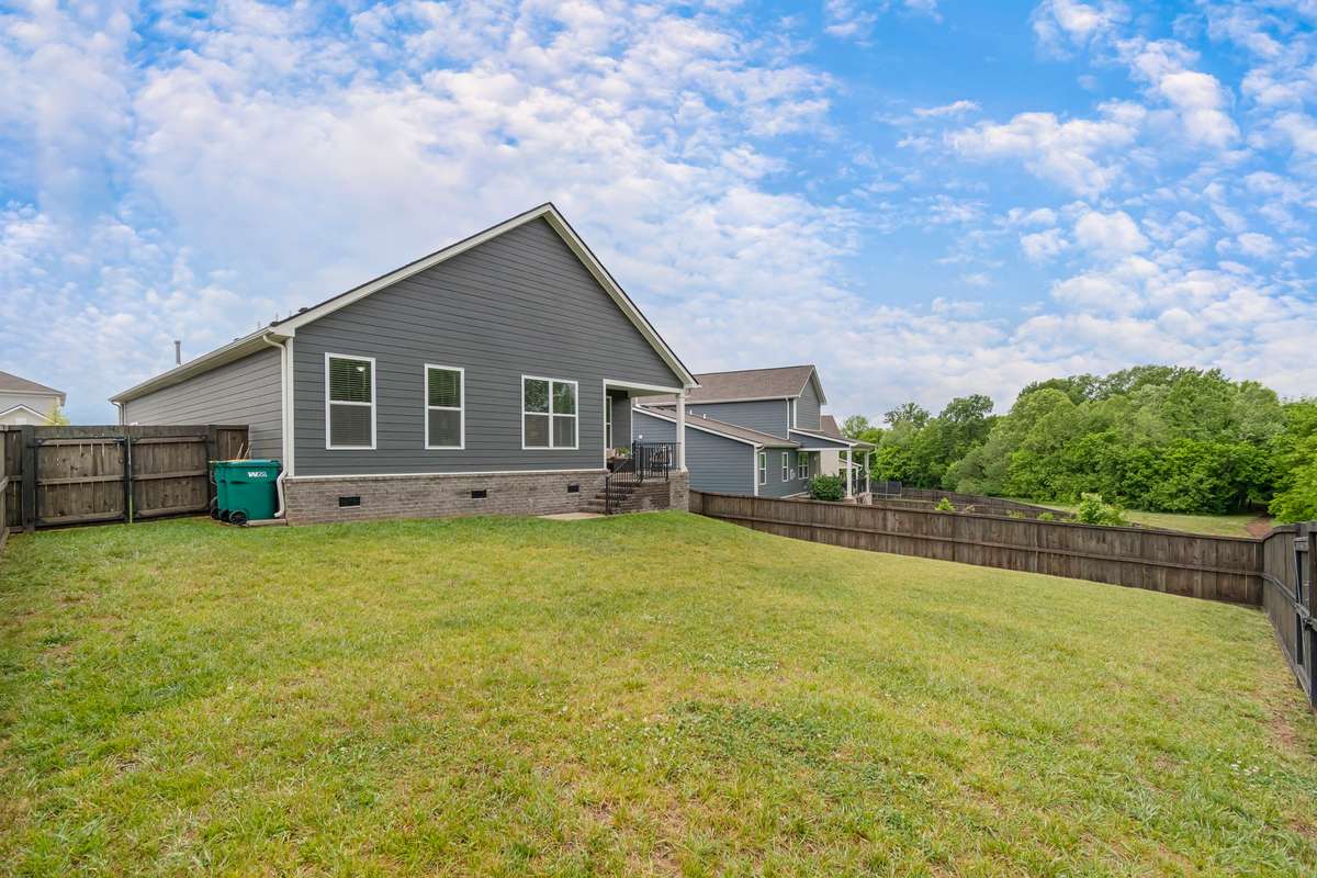 Wonderful open space for your backyard lifestyle, already includes a privacy fence and easy access to a walking trail.  This is an incredible added value for your home.