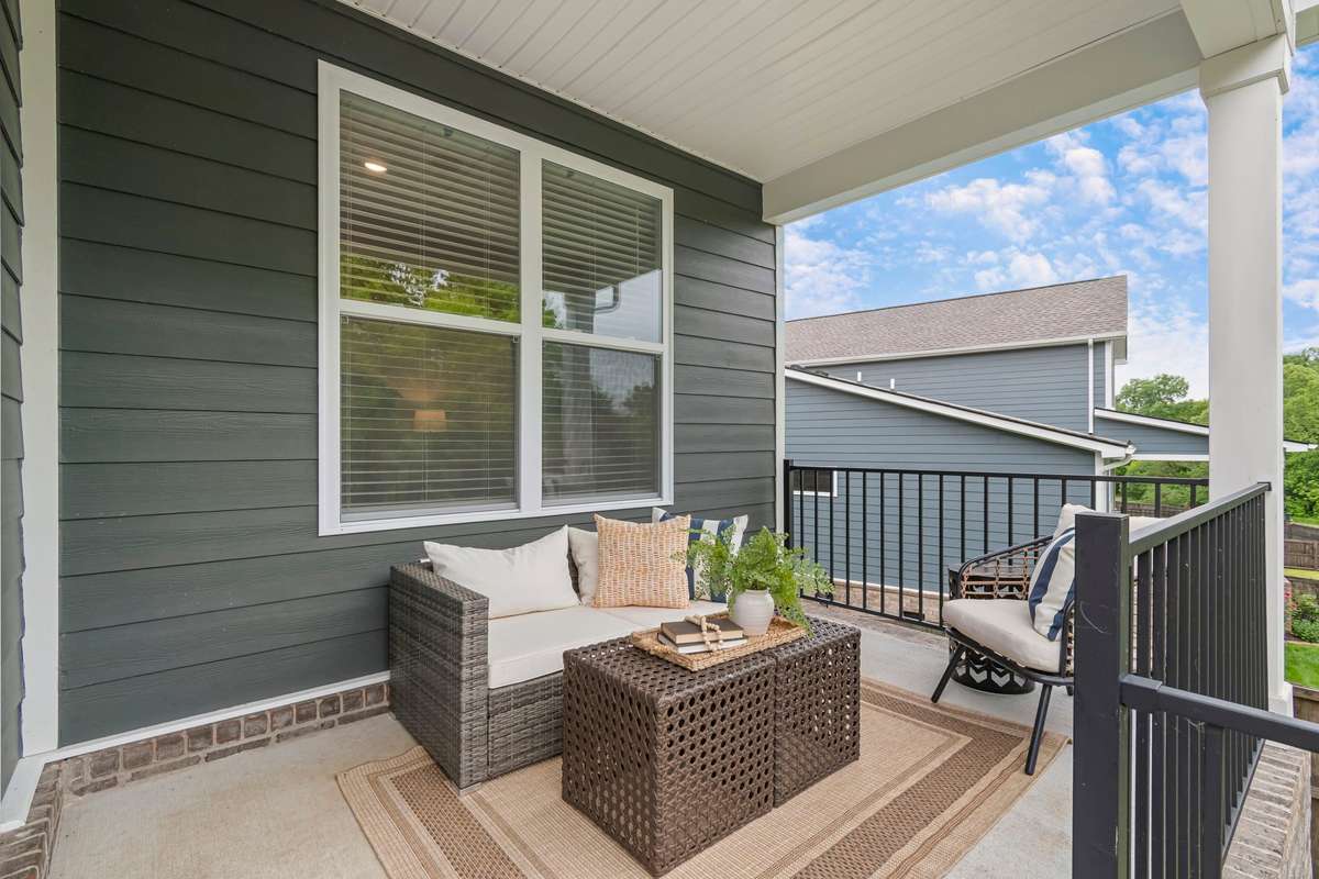 Covered back patio designed for year-round enjoyment—perfect for relaxing, entertaining, or enjoying quiet evenings outdoors.