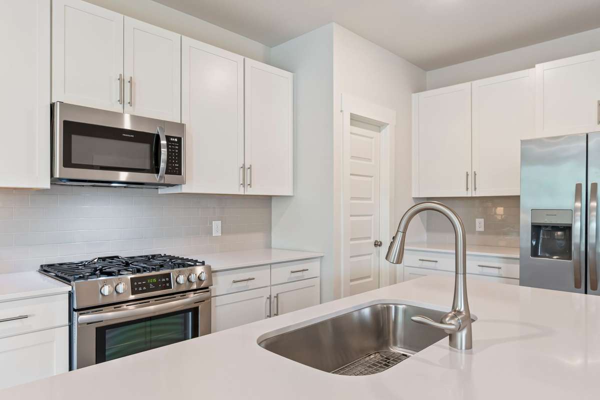 Oversized island with seating—perfect for casual dining, entertaining, or gathering.