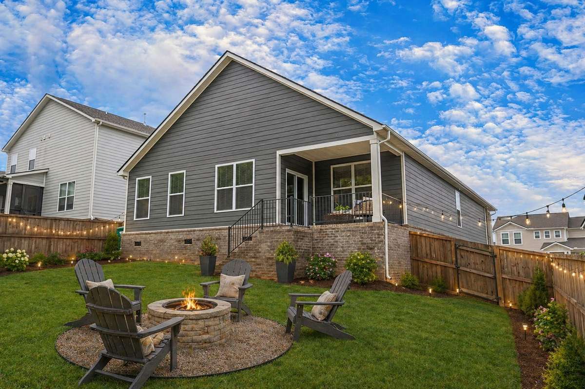 This backyard photo is virtually staged for design inspiration.