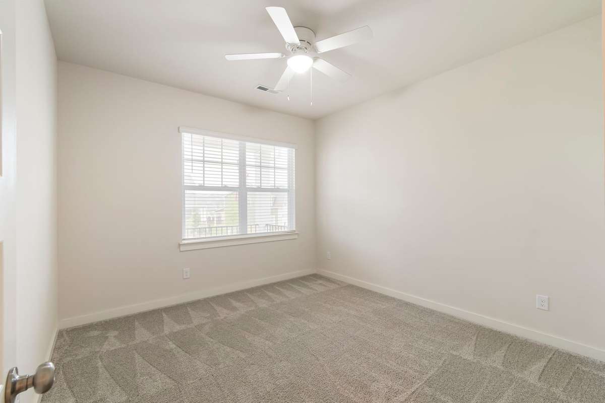 Bedroom 2, currently with no furniture, but the next two photos are virutally staged for design inspiration.  Also, enjoy a walk-in closet in this bedroom!