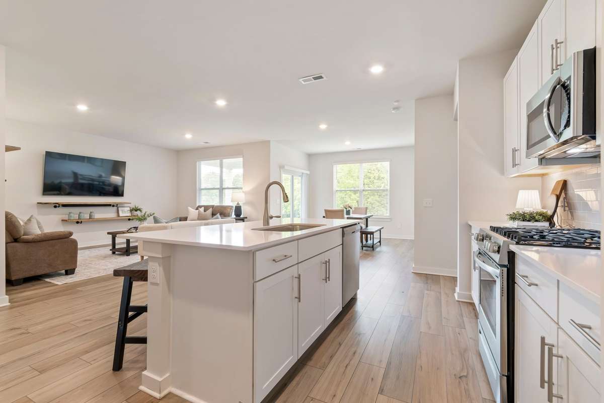 Spacious kitchen with ample prep space, modern finishes, and great natural light.