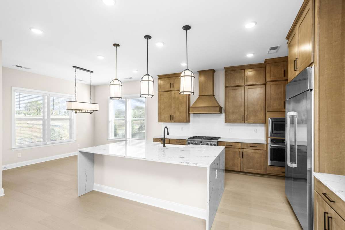 Another view of gourmet kitchen and eating area