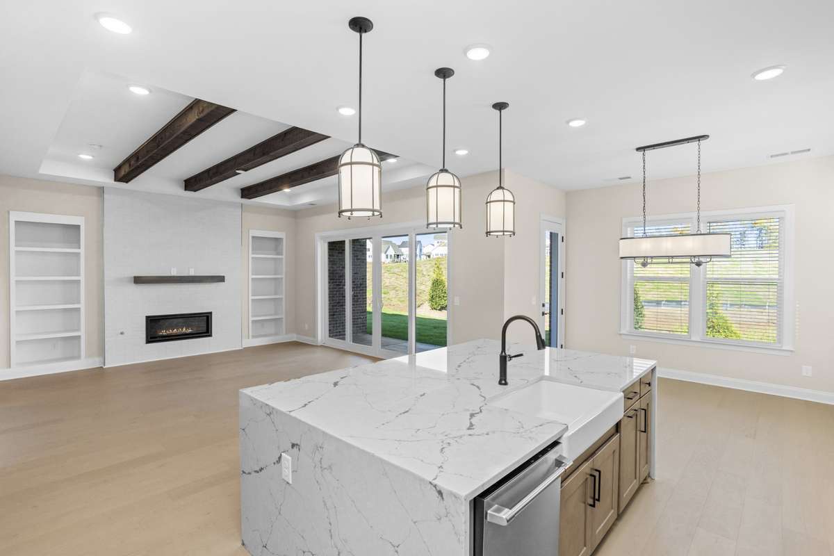 View of Kitchen into family room and eating area