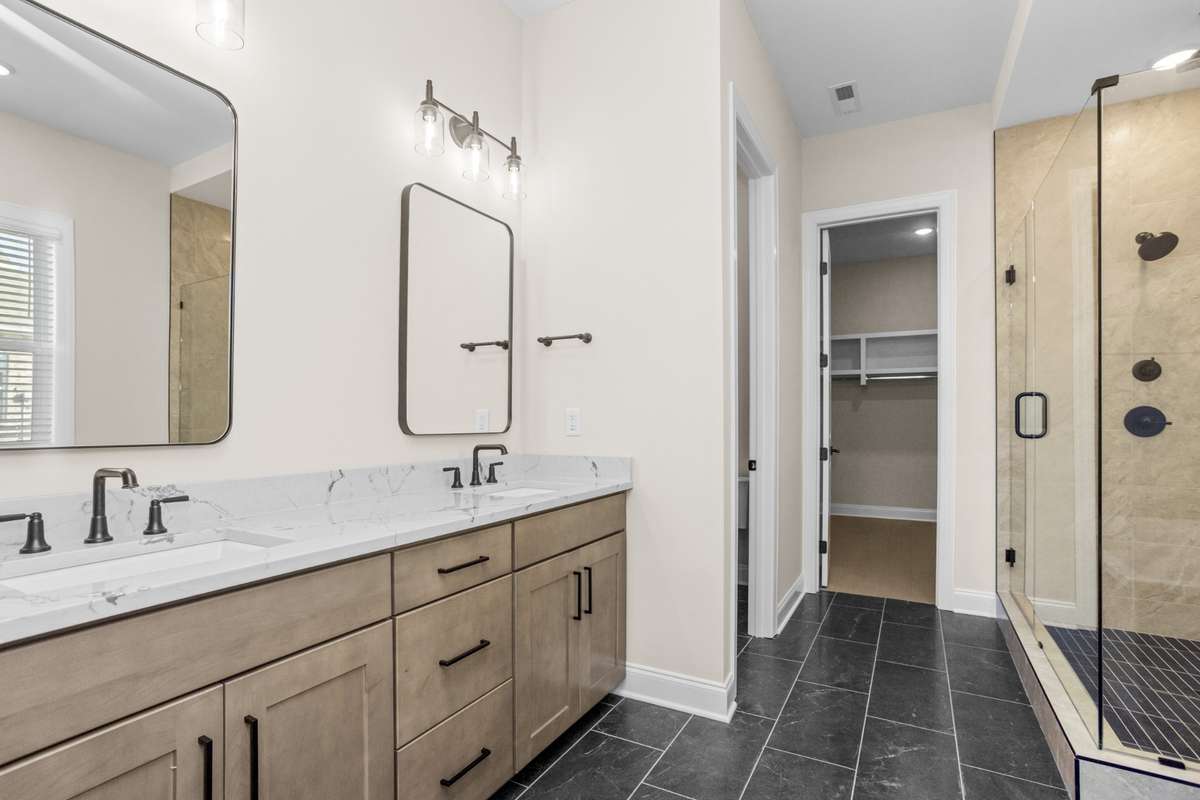 View of master bath and peek into master closet