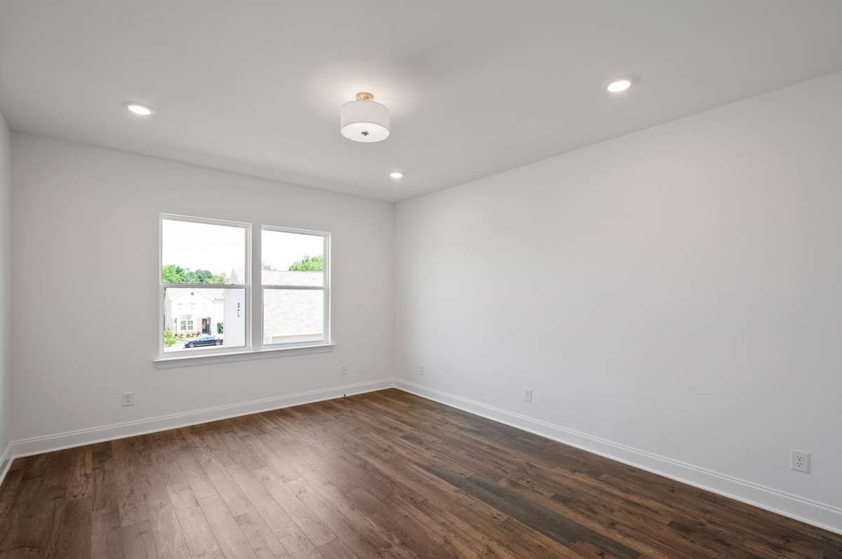 Tucked in the rear corner for maximum privacy, the owner's suite is a true retreat...