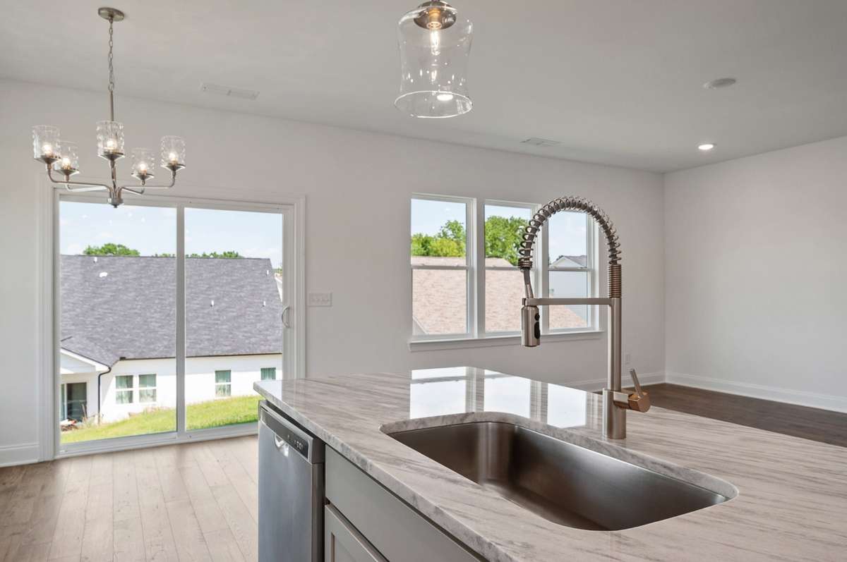 Ample space for entertainment / hosting friends + family to gather in this wide-open room.