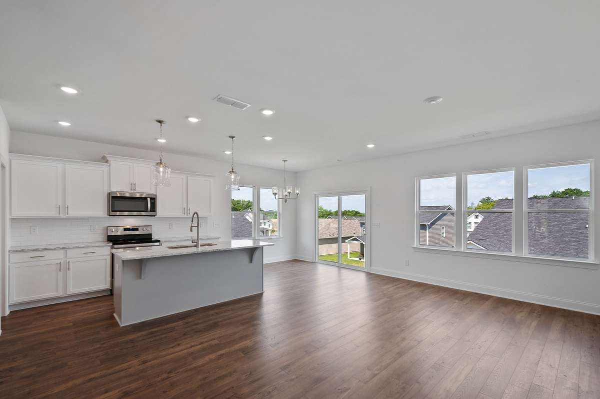 Gather loved ones in the true heart of this home!