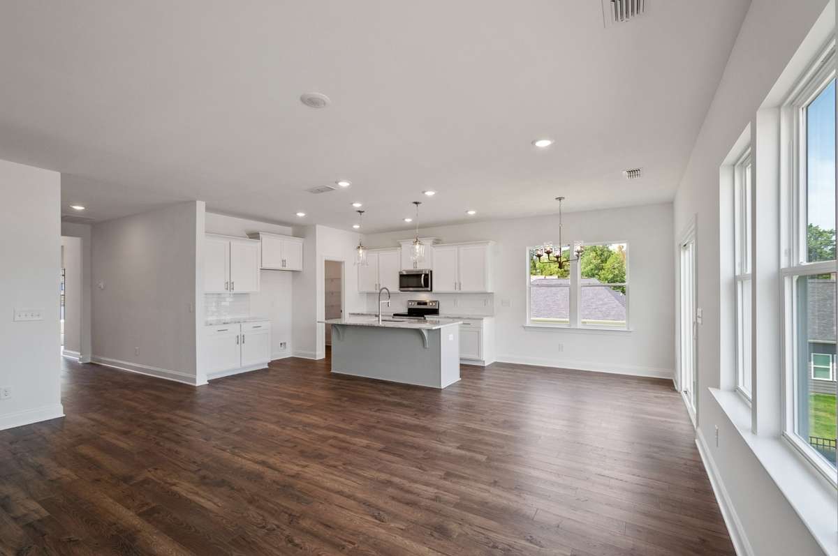 Gather loved ones in the true heart of this home!