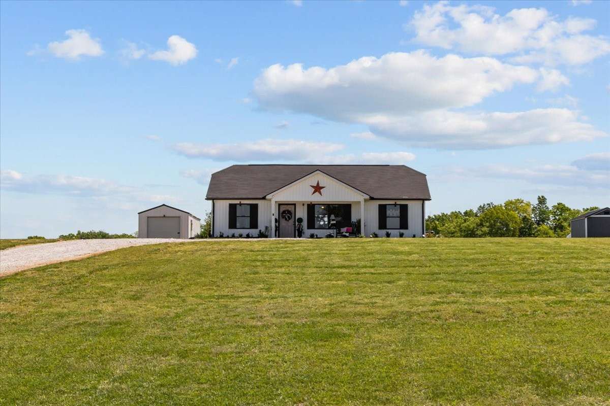 This home sits perfect atop the hill. Enjoy the Breeze❤️