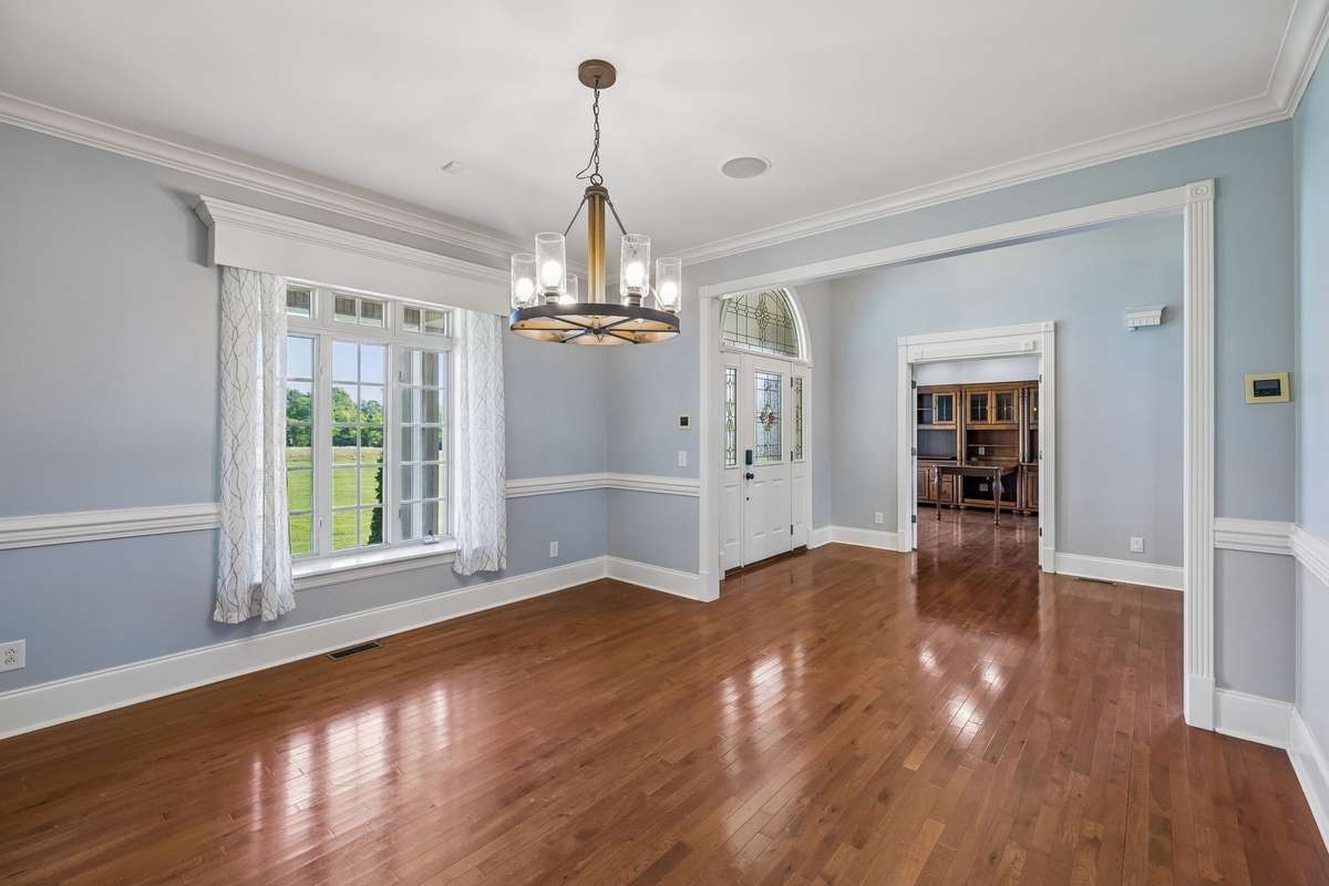 Formal Dinning Room featuring a wet Butler's Pantry