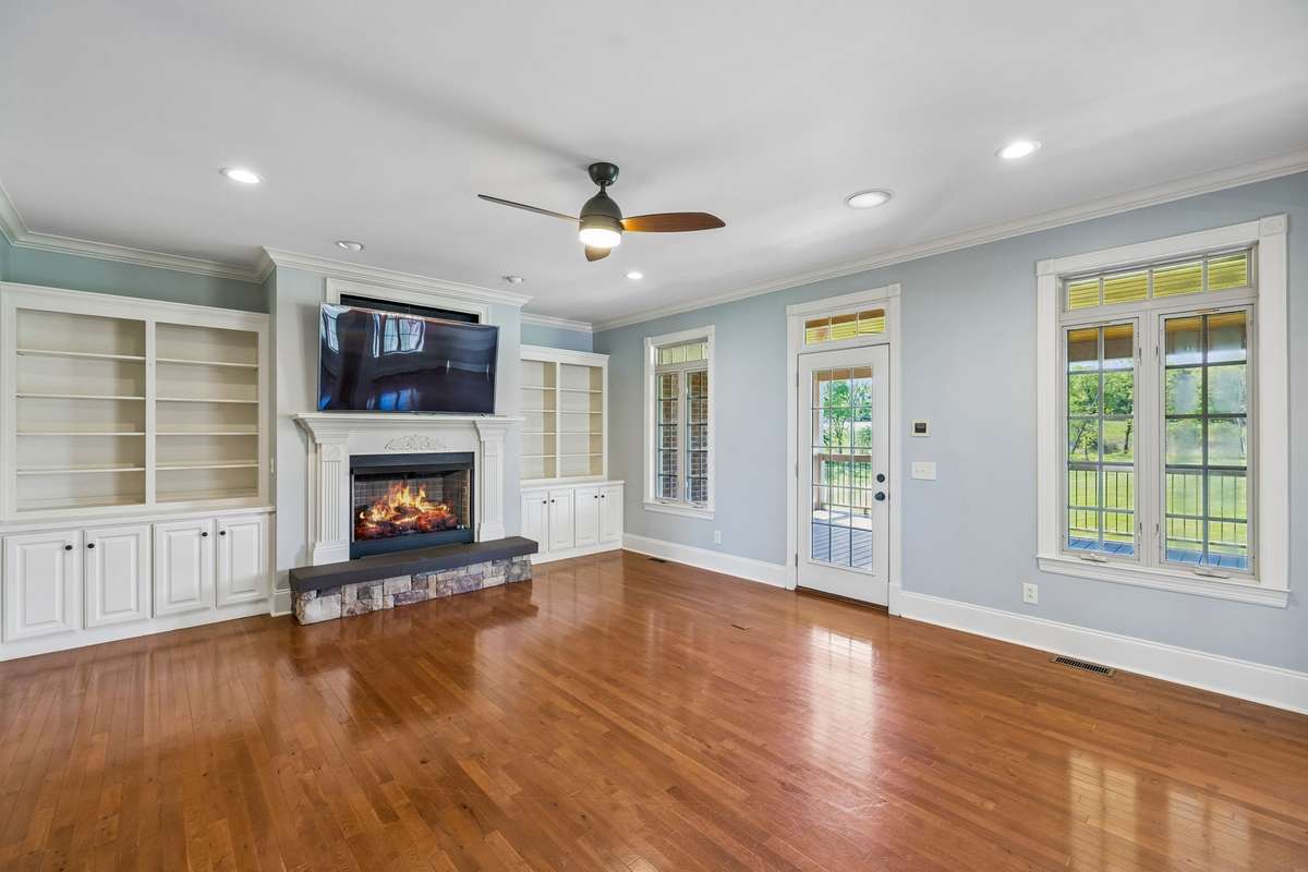 Living Room with fire place burning