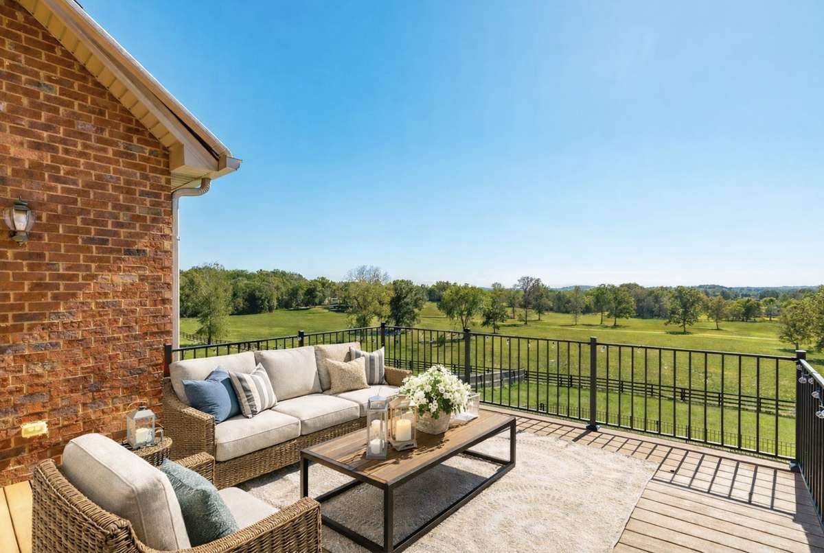 Surrounded by open views and fresh air, the spacious balcony feels like a private retreat — perfect for both lively gatherings and quiet reflection.