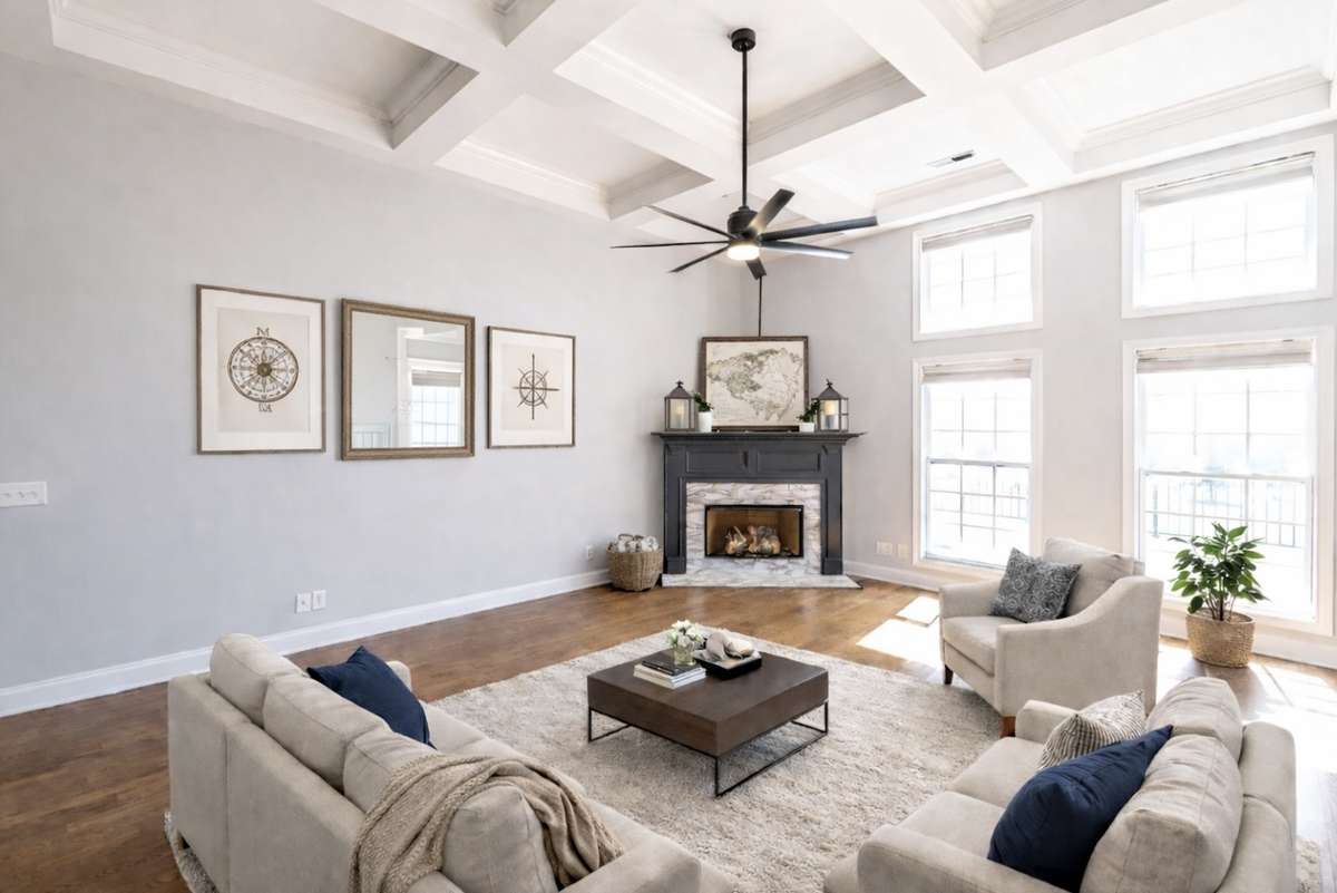 Evenings settle in here.
The fireplace glows, conversations linger, and the coffered ceiling adds a sense of quiet elegance. A room made for cozy nights, meaningful conversations, and memories that last.