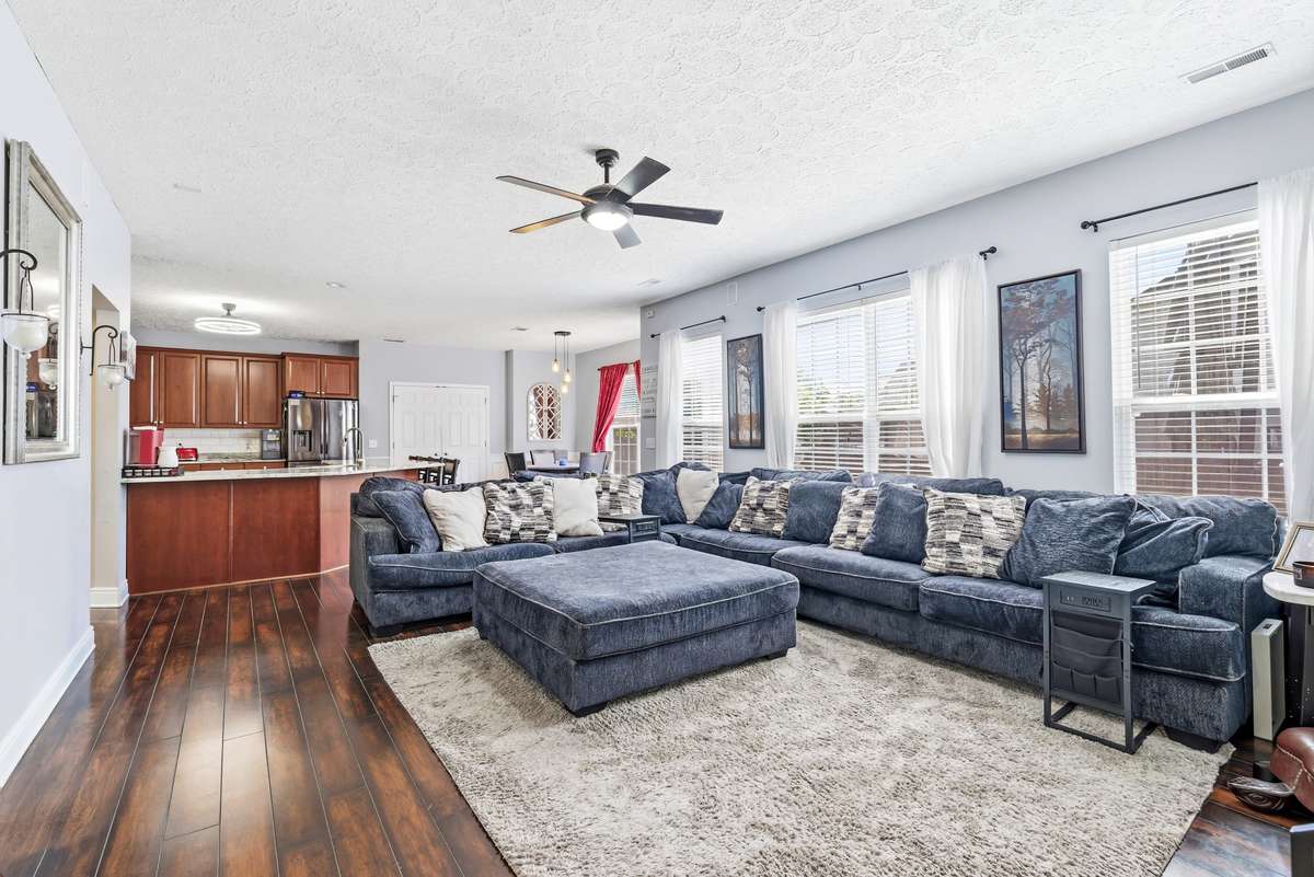Den open to the spacious kitchen!