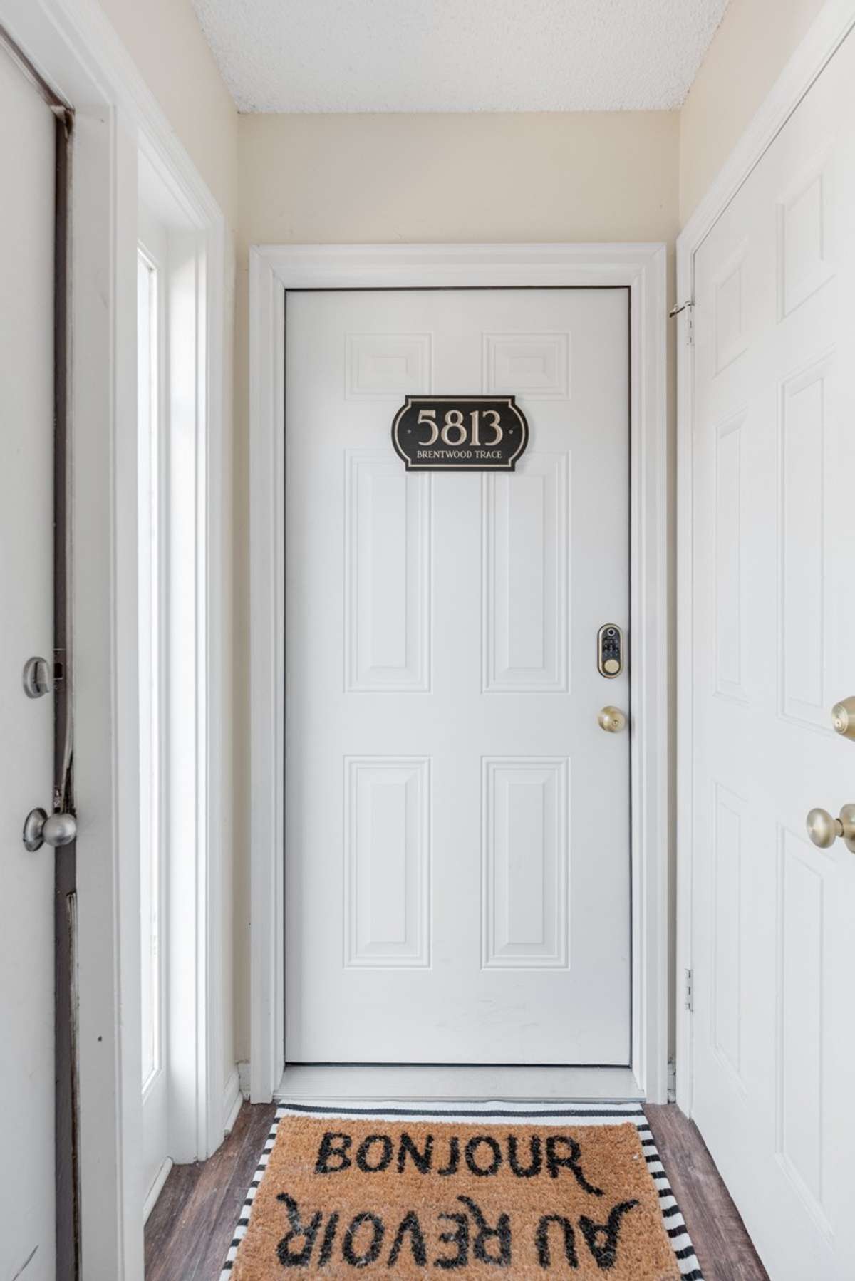 Private entry - see storage door to the right.  Room for your bike and door extra storage items