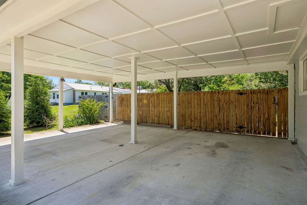 Enjoy the convenience of an expansive carport—or take advantage of the existing footprint to easily convert the space into a fully enclosed garage.