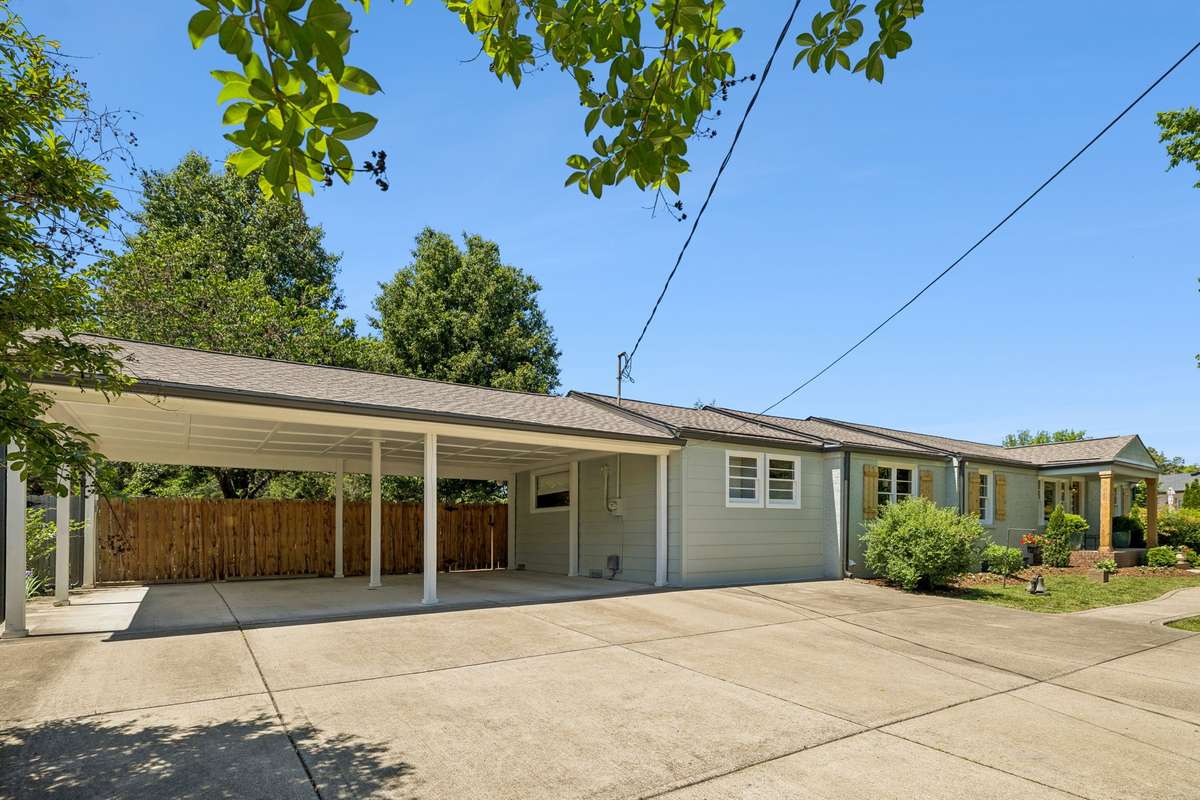 Built to last, the 6" poured concrete driveway provides ample covered and uncovered parking area.