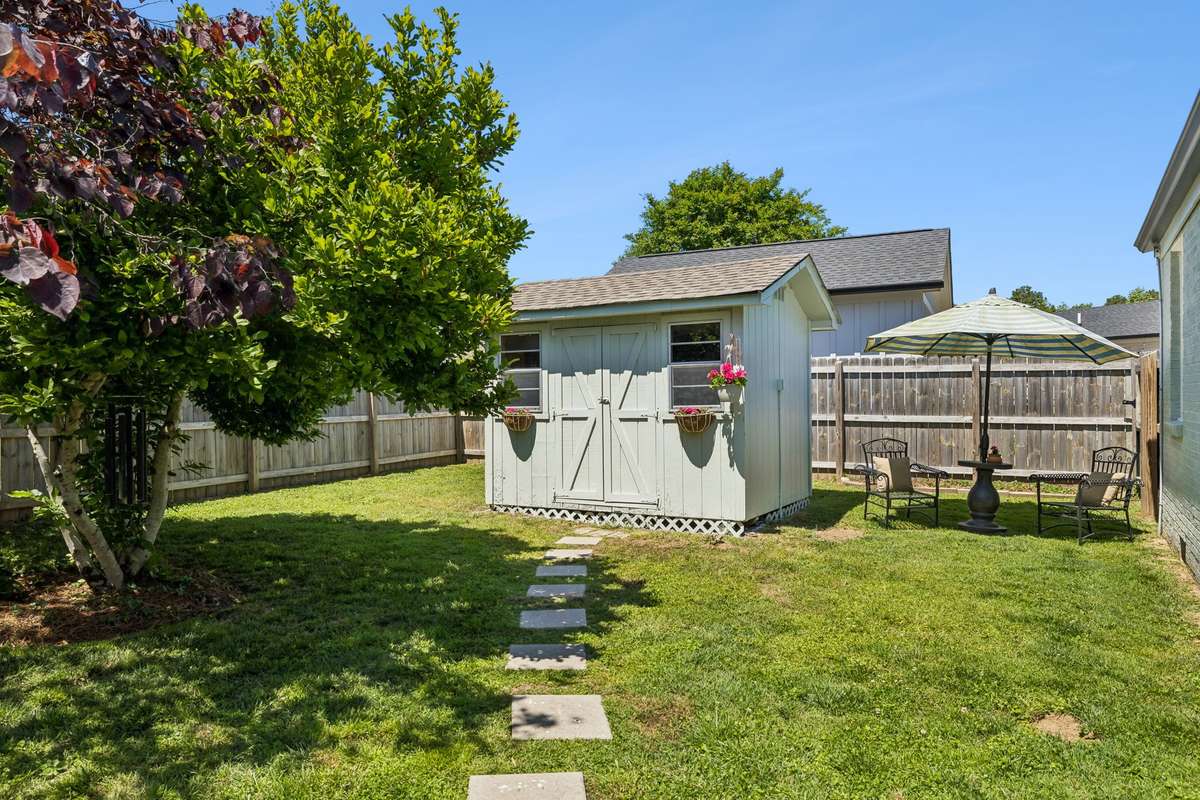 A restored storage shed offers flexible additional space.