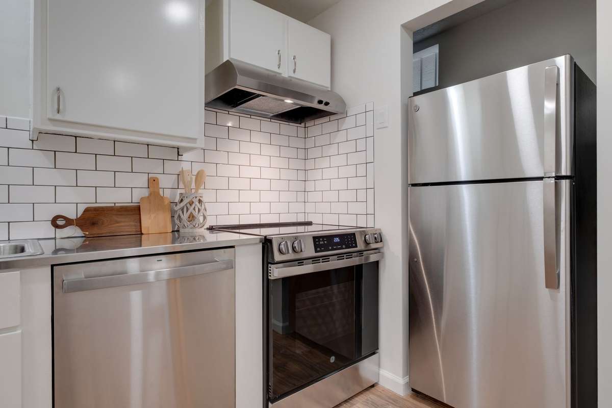 Unit B. All new appliances and custom stainless steel countertops.