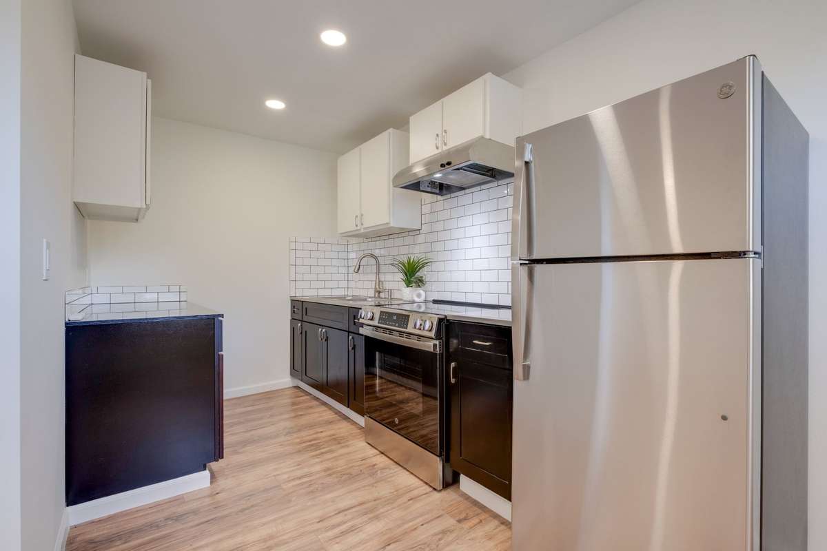 Unit C kitchen. All new appliances and custom stainless steel counter tops