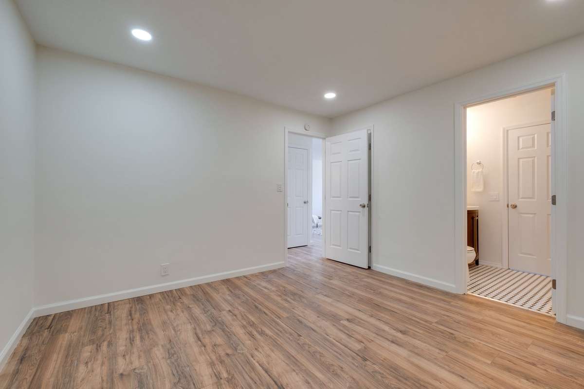 Unit B bedroom 1. Full bath to the right.