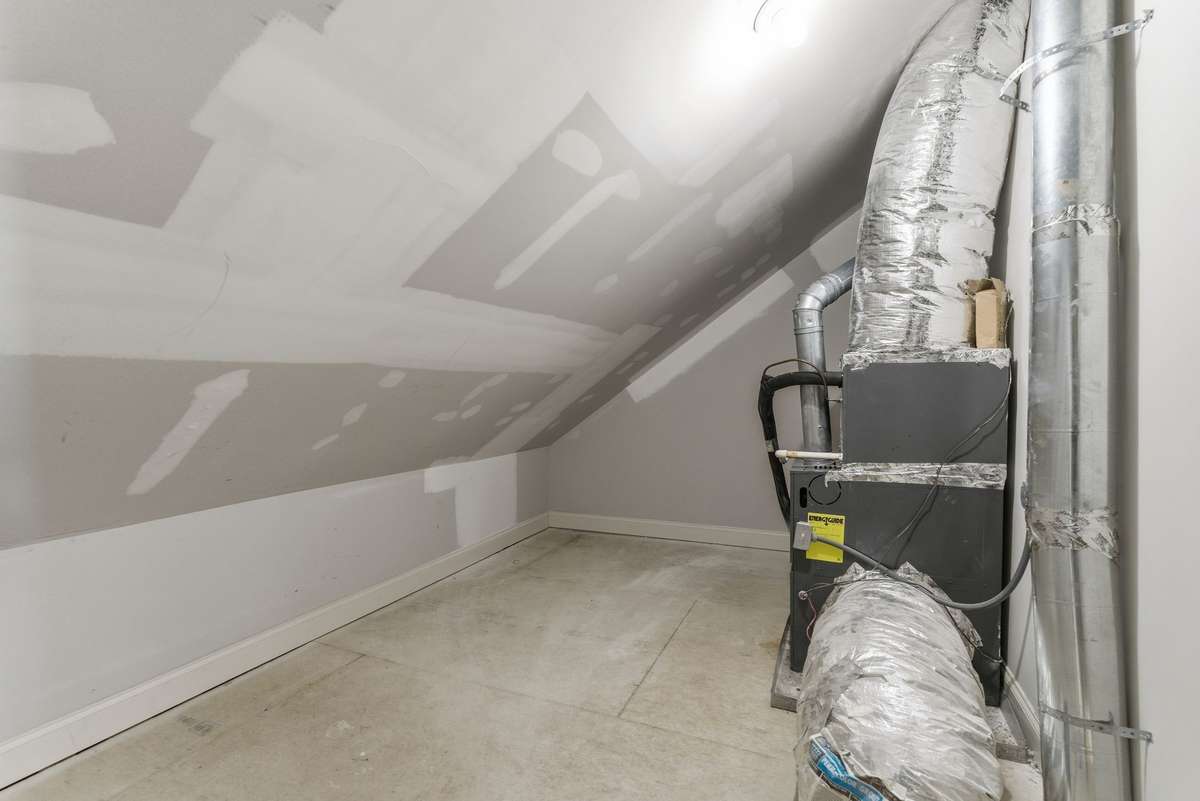 Unfinished attic space; perfect for additional storage!