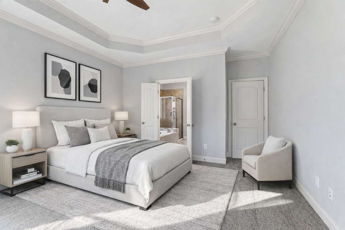 Virtually staged to highlight the relaxing, serene environment the primary suite offers — a peaceful retreat designed for comfort, calm, and effortless elegance.