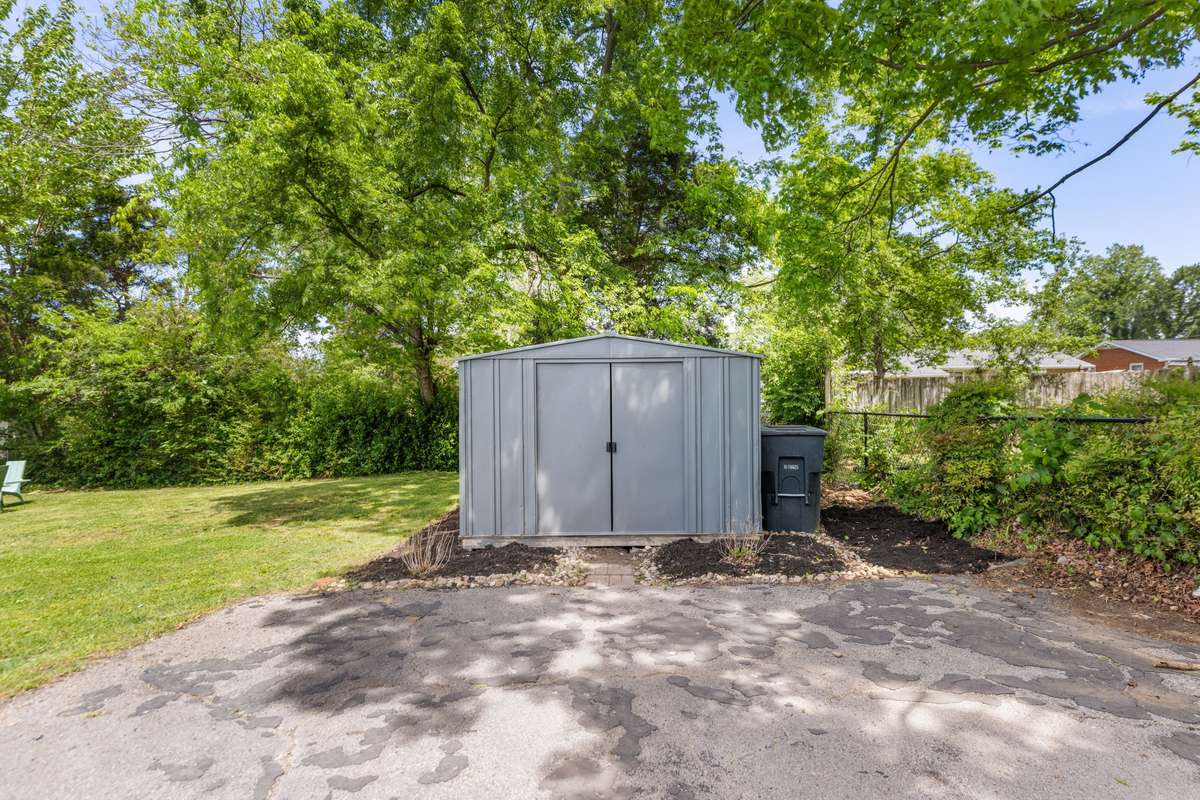 Back shed is perfect to store bikes, lawnmower, etc..