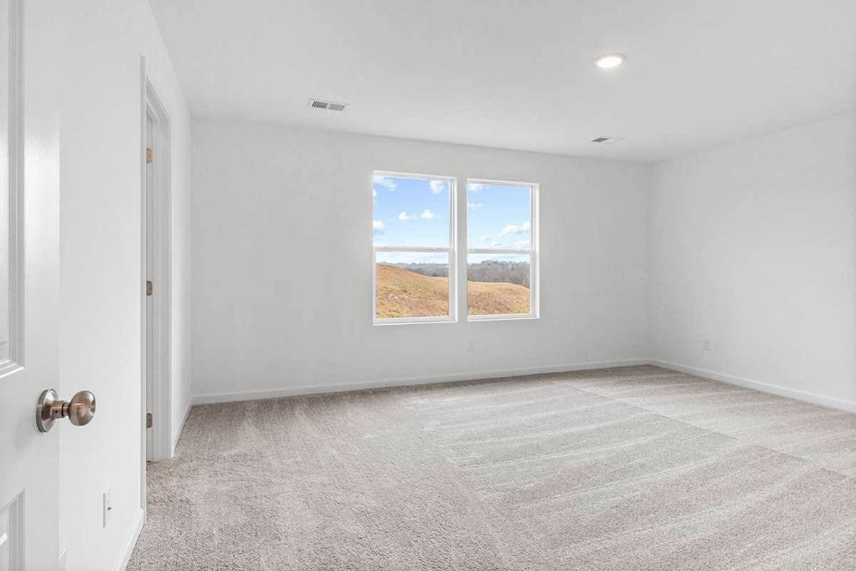This is a photo of one of our model homes. Please know that some of the exterior and interior finishes, paint, and features may vary.
