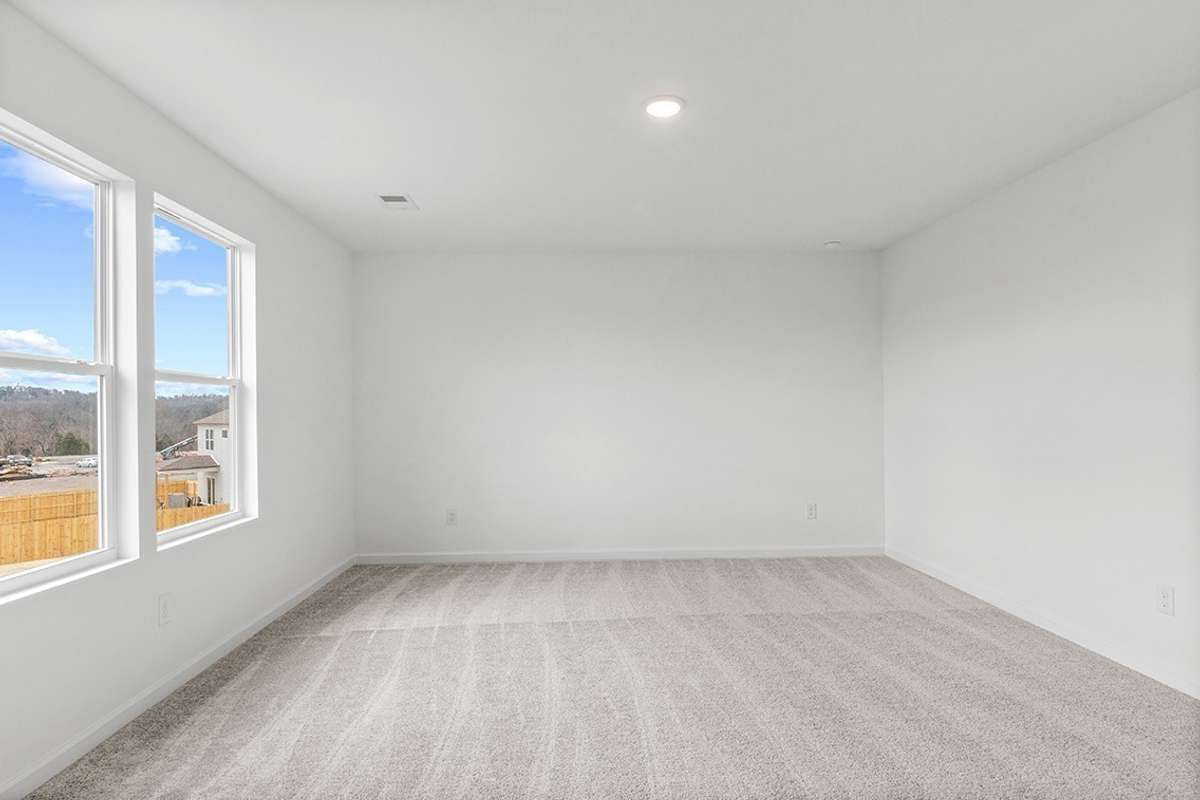 This is a photo of one of our model homes. Please know that some of the exterior and interior finishes, paint, and features may vary.