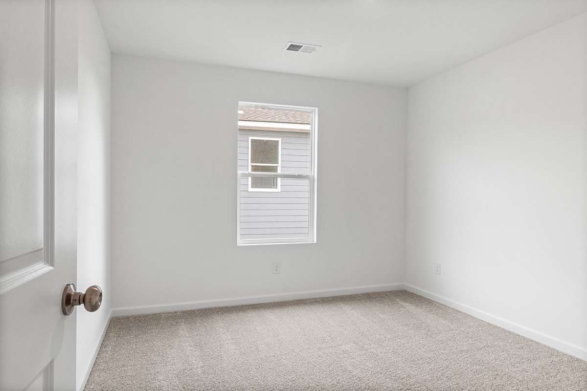 This is a photo of one of our model homes. Please know that some of the exterior and interior finishes, paint, and features may vary.