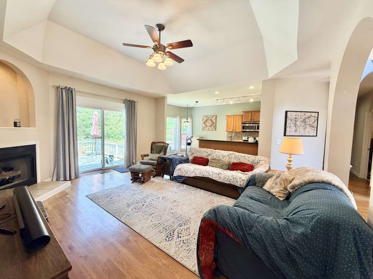 Vaulted living room with gas fireplace