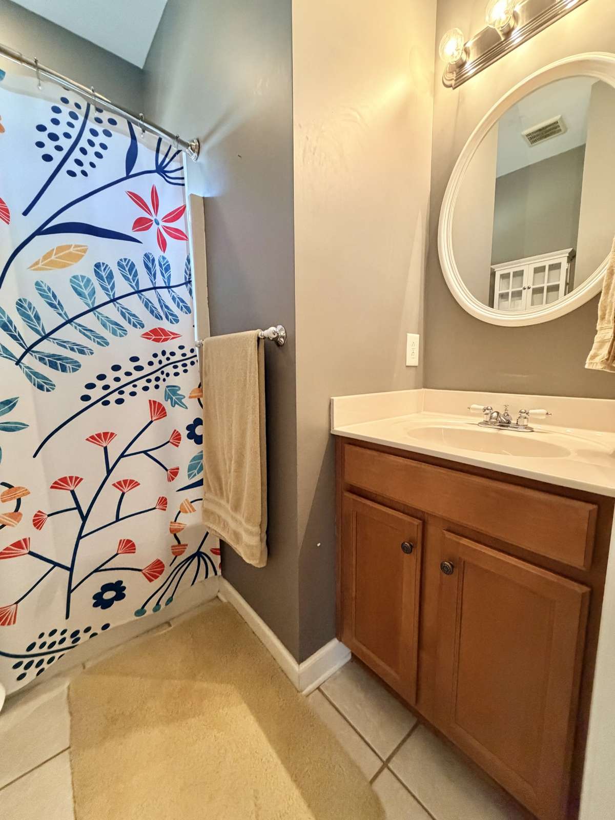 Hall bathroom with shower tub combo