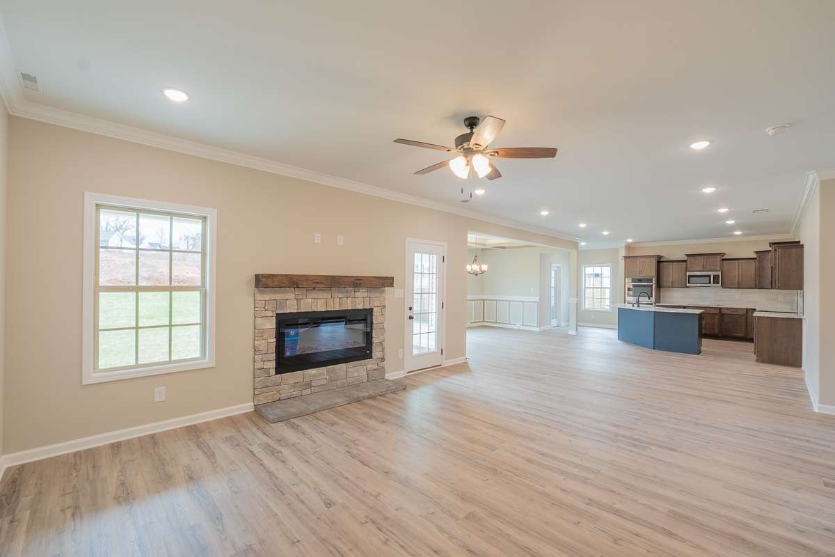 Open Layout Downstairs and SPC Flooring Throughout the Foyer, Downstairs Hallway, Living Room, Kitchen and Dining Room!