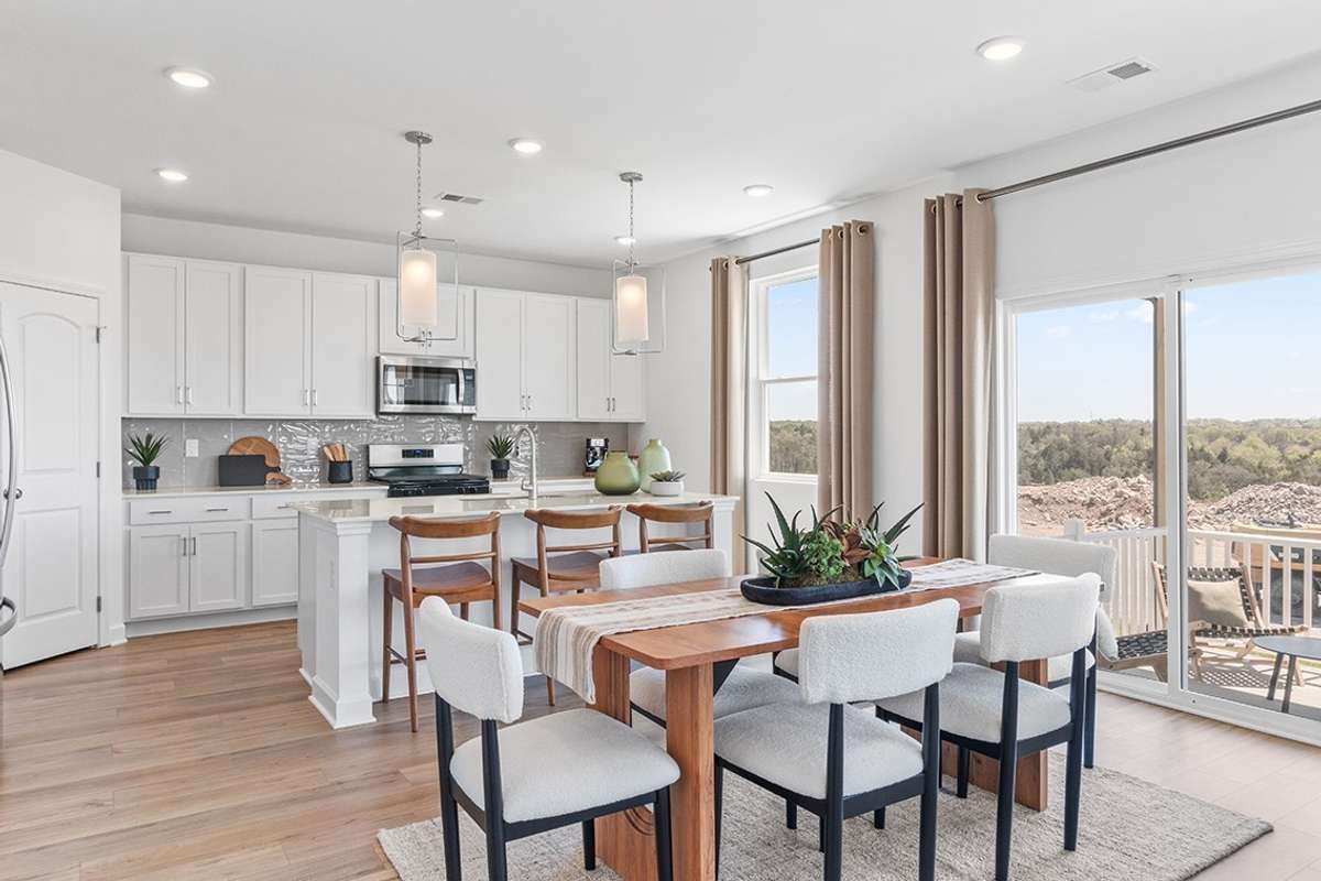 This is a photo of one of our model homes. Please know that some of the exterior and interior finishes, paint, and features may vary.