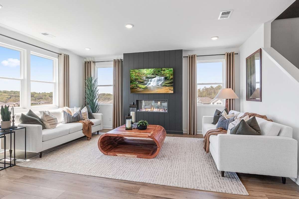This is a photo of one of our model homes. Please know that some of the exterior and interior finishes, paint, and features may vary.