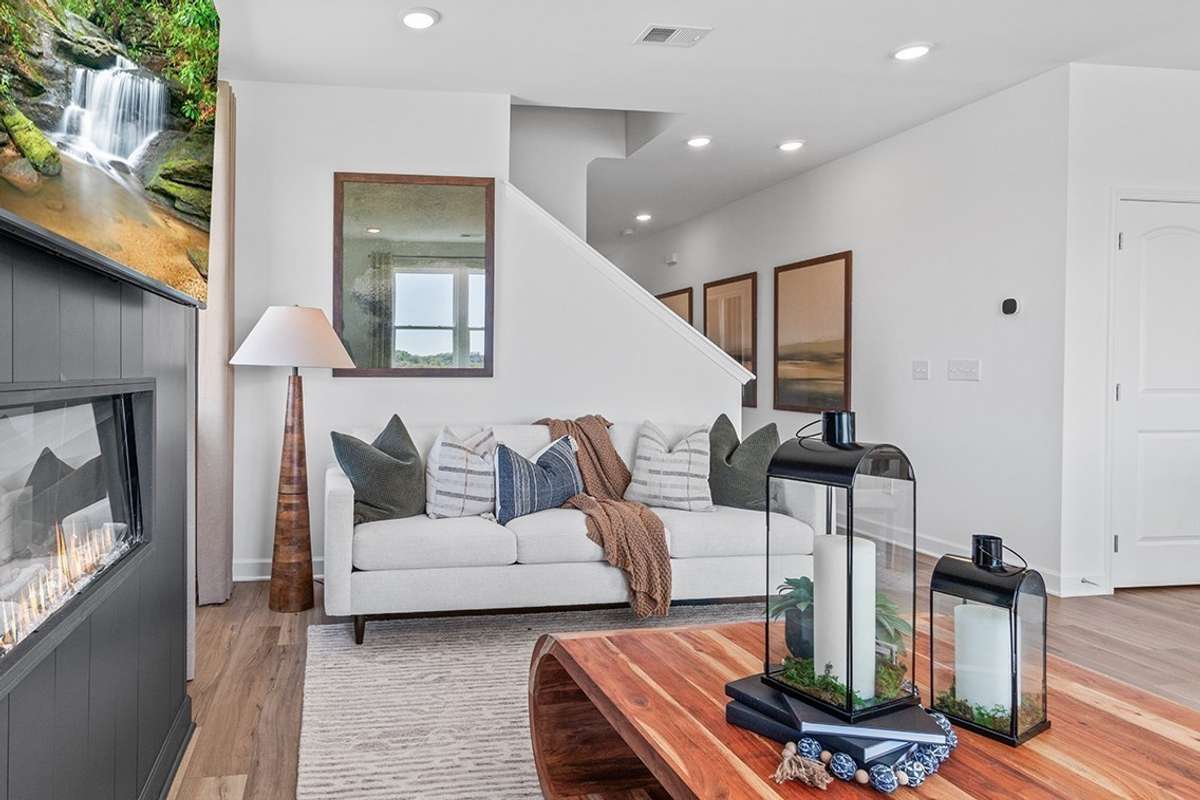 This is a photo of one of our model homes. Please know that some of the exterior and interior finishes, paint, and features may vary.