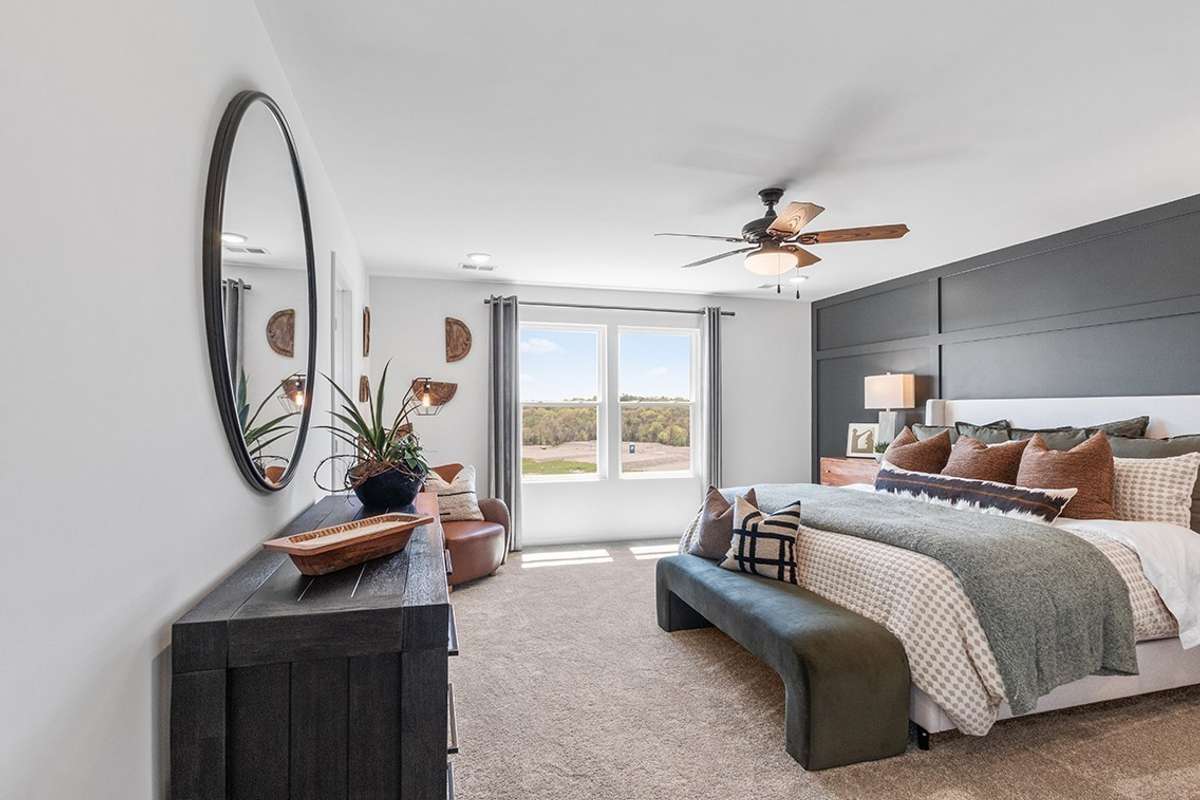 This is a photo of one of our model homes. Please know that some of the exterior and interior finishes, paint, and features may vary.