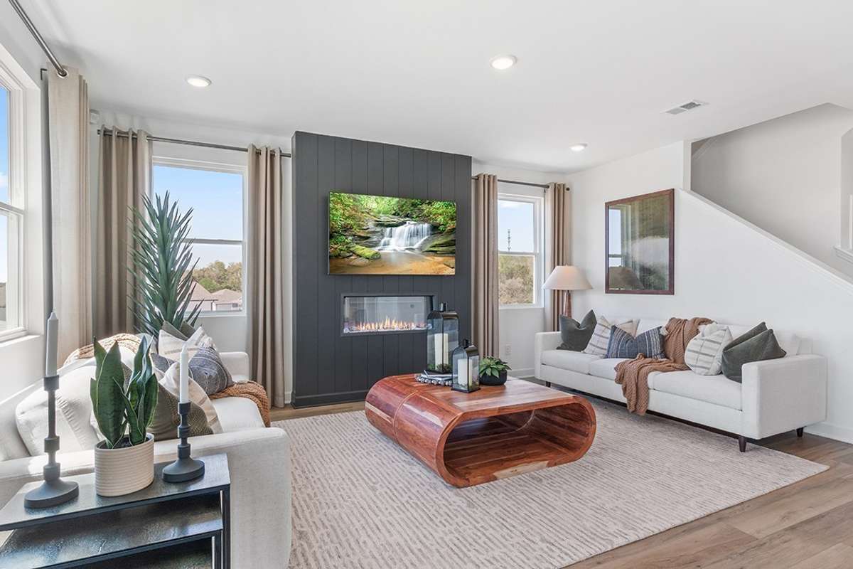 This is a photo of one of our model homes. Please know that some of the exterior and interior finishes, paint, and features may vary.