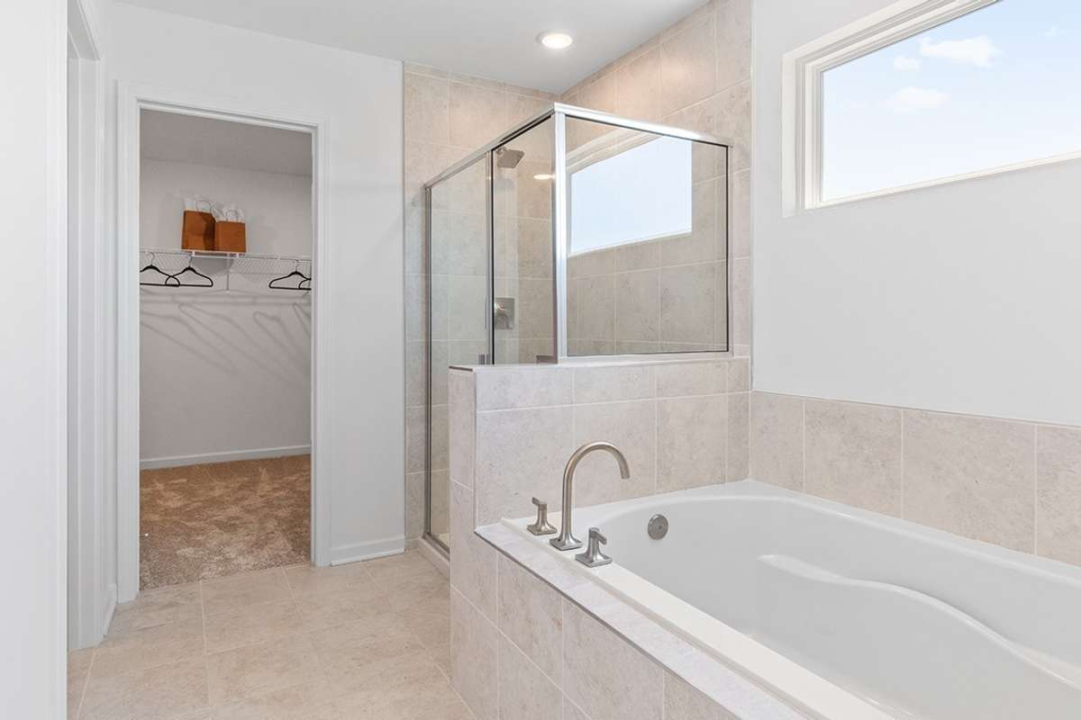 This is a photo of one of our model homes. Please know that some of the exterior and interior finishes, paint, and features may vary.