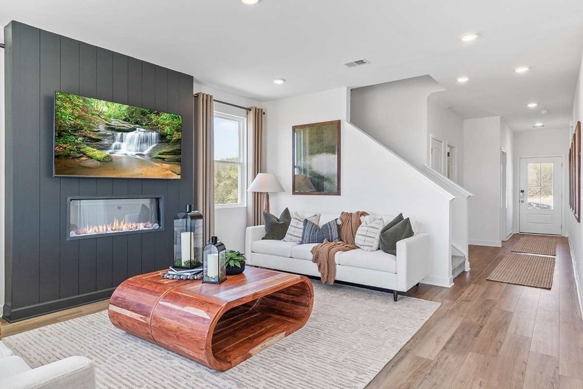 This is a photo of one of our model homes. Please know that some of the exterior and interior finishes, paint, and features may vary.