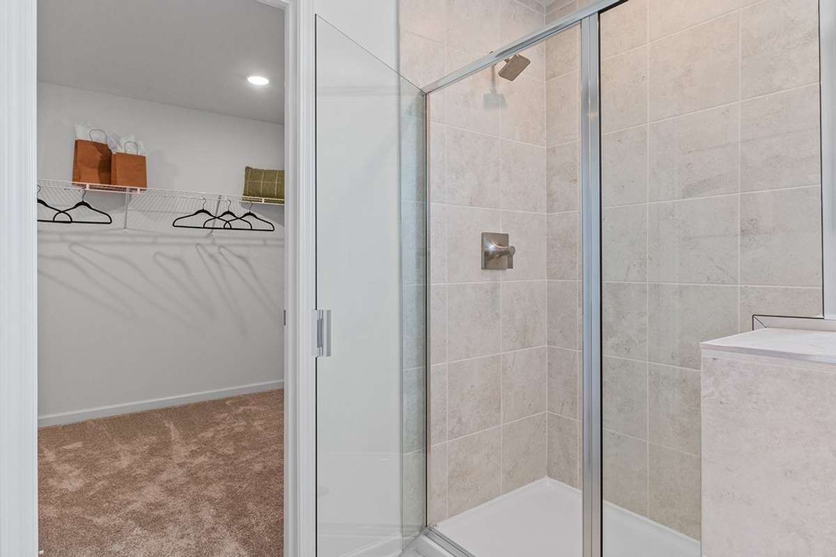 This is a photo of one of our model homes. Please know that some of the exterior and interior finishes, paint, and features may vary.