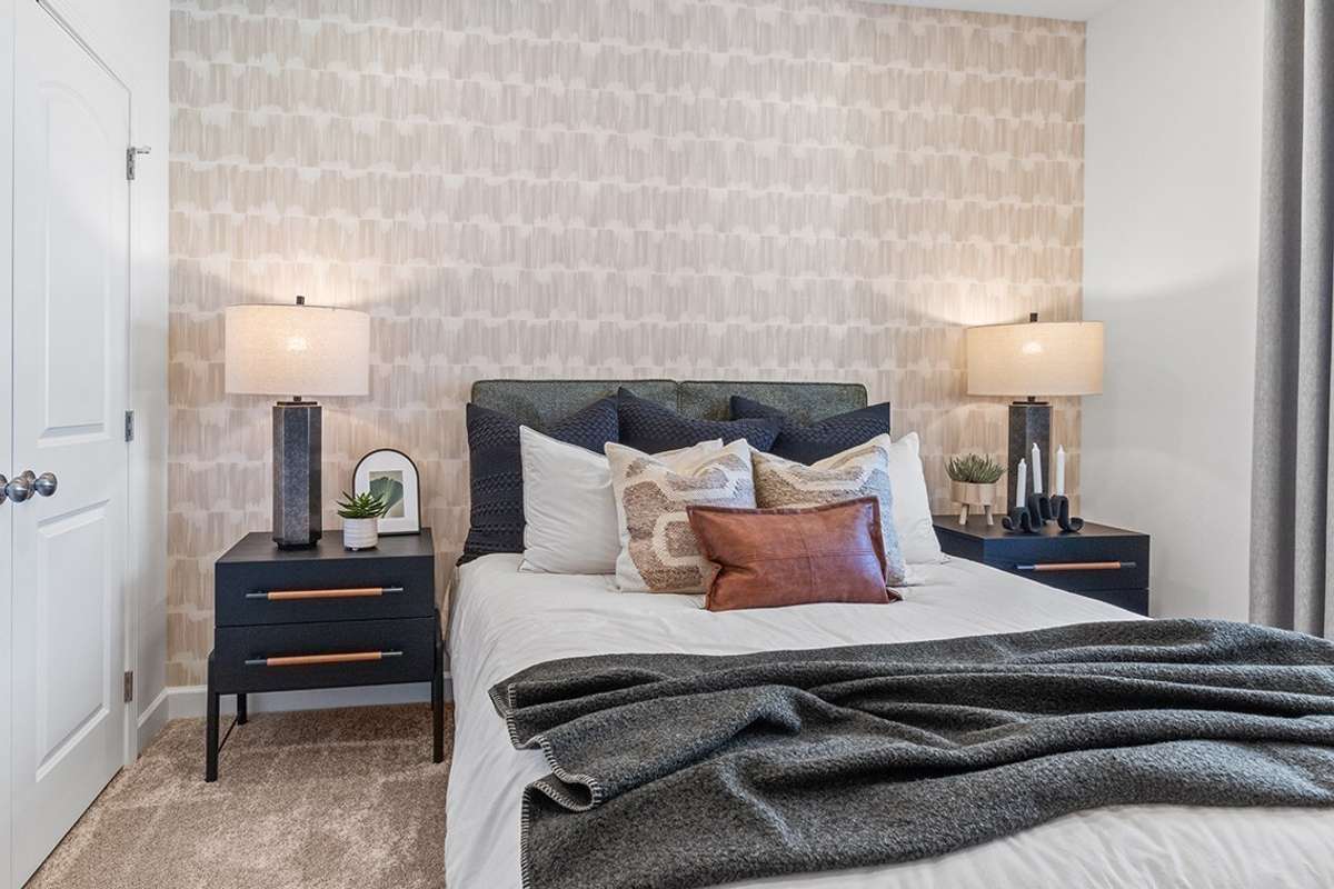 This is a photo of one of our model homes. Please know that some of the exterior and interior finishes, paint, and features may vary.